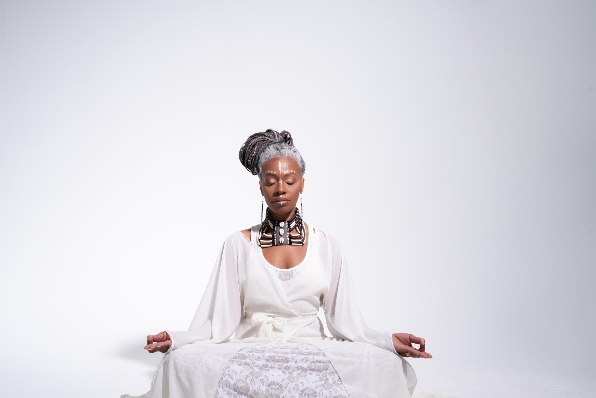 Althea Lawton-Thompson seated in meditation